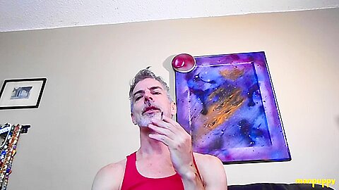 Step daddy Richard Lennox smokes while taunting his stepson
