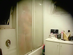 Stepmother spied nude in bathroom