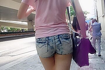 Street candid teen 18+ ass wrapped in tiny jeans shorts