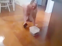 Submissive Cleans Floor Naked In Heels