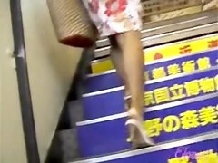 Tan blonde asian gets skirt sharked in a crowded place 