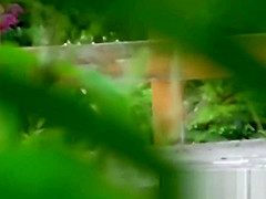 Tantalizing Japanese in skirt peeing behind bench in park