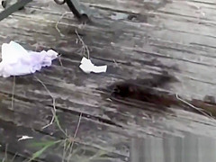 Tantalizing Japanese in skirt peeing behind bench in park