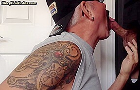Tattooed oral DILF sucks gloryhole dick till cum in mouth