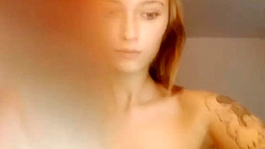Tattooed russian girl masturbates on cam