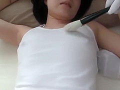 Teasing brush tickles on girl's tummy and nipples