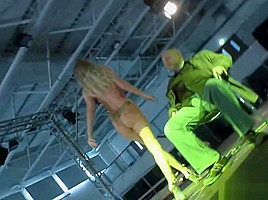 Tempting blonde bitch goes naked on the stage