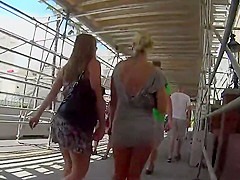 Thick legs and ass in two upskirt shots