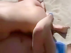 Threesome Outdoors In Public At A Beach