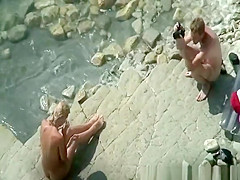 Tight body blonde nudist posing