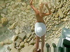 Tight body blonde nudist posing