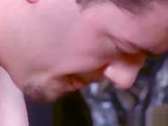 Top stud binds bottom and jerks his cock