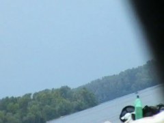 Topless sleek hotties on the nude beach getting filmed by a