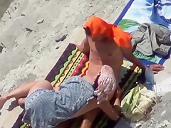 Two Nude Beach Handjobs (special today 2 for the price of 1)
