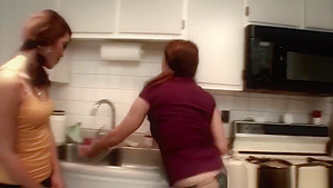 Two alluring babes got very horny while in the kitchen