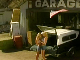 Two sexy girls masturbating and pussy licking by the car