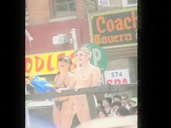 Undressed girl with small tits on a parade float