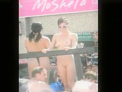 Undressed girl with small tits on a parade float