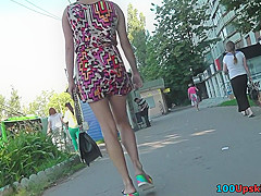 Upskirt porn with brunette-hair gal in a public place