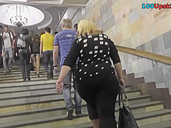 Upskirting thong footage of a brunette in mini skirt