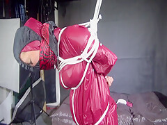 Watch Sandra Beeing Bound Gagged And Pantyhooded In Her Shiny Nylon Rainwear