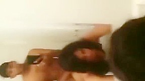 Watch hot brunette babe with black male in bathroom