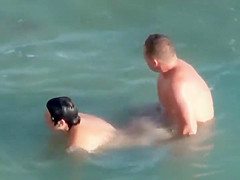 Wave knocks her off his penis