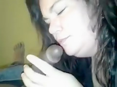 White girl blowing black rod