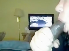White girl blowing black rod