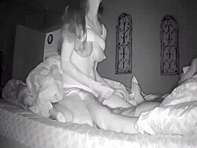 Wife giving handjob to husband on