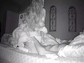 Wife giving handjob to husband on