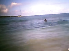 Wife on the public beach