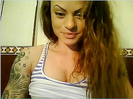 Wild Angel kisses her muscles