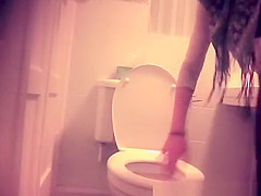 Woman caught in toilet taking a pee