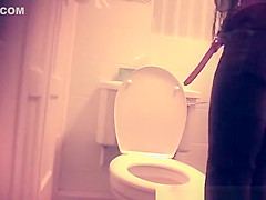 Woman caught in toilet taking a pee