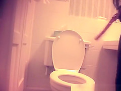 Woman caught in toilet taking a pee