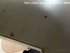 Woman in high heels caught in public toilet pissing
