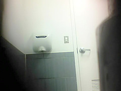 Young hairy pussy spied in toilet