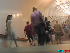 Yummy ass of a brunette seen in real upskirt movie