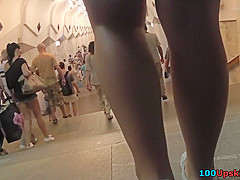 Yummy ass of a brunette seen in real upskirt movie