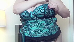 big booty Eliza squeezes her curves into a corset