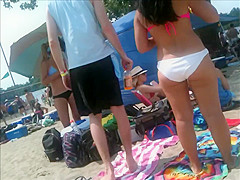 2 bikini friends at the beach candid