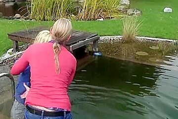 german wetlook with fully clothes swimming