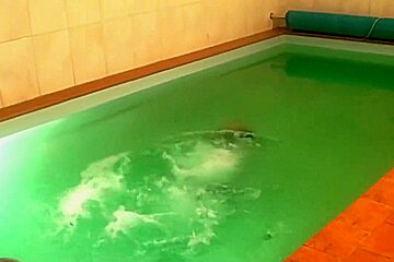 german wetlook with fully clothes swimming
