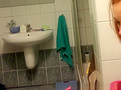 in bathroom catches redhead nice ass