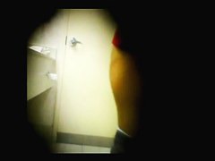 man filming pissing girls in bathroom