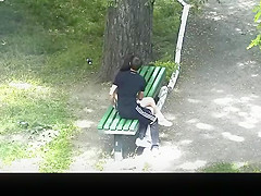teen 18+ couple making out in public park bench