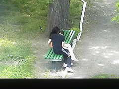 teen 18+ couple making out in public park bench