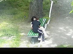 teen 18+ couple making out in public park bench